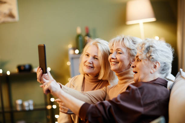 istock Three old female friends making selfie 1362353857