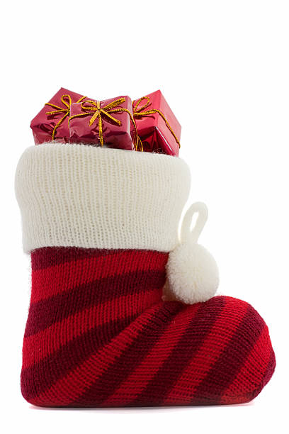 christmas stockings with presents stock photo