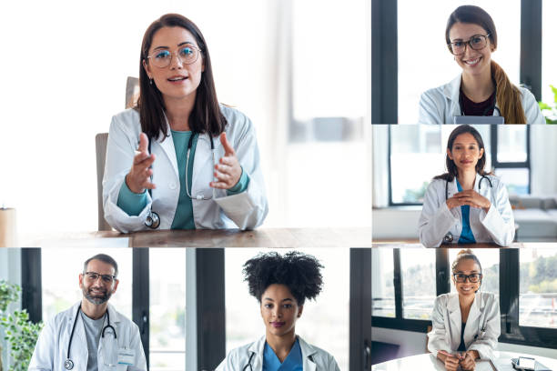istock Headshot screen application view of diverse doctors have work web conference. 1362359119