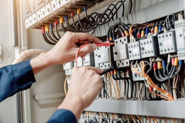 istock Electrician engineer work tester measuring voltage and current of power electric line in electrical cabinet control , concept check the operation of the electrical system . 1362360465