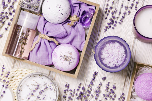 istock Products with lavender essential oil as handmade gift box, bath bombs, lavender spray and sachets on wooden table. Mindful gifting, natural aromatherapy cosmetics for body care 1362364288