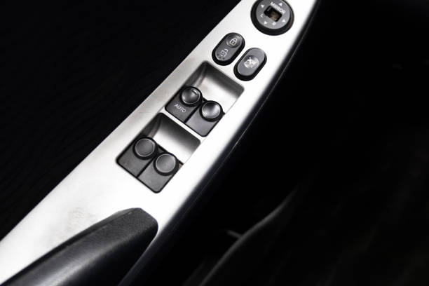 istock Interior Design Of The Modern Car: Window Adjustment Buttons 1362369871