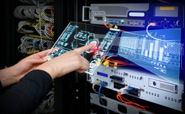 woman holding ar device panel and analyzing system in server room. - computer network server repairing technology imagens e fotografias de stock