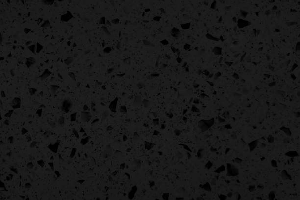 istock black quartz surface for bathroom or kitchen countertop. close up artificial stone showing stone pigments, crystal, sand, mineral texture and pattern. counter top texture, granite imitation texture. 1362376076