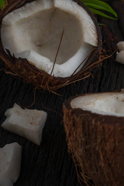 istock Chopped coconut on a wooden background 1362377587