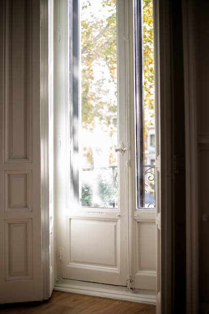 istock antique white wooden window down to the floor 1362382037