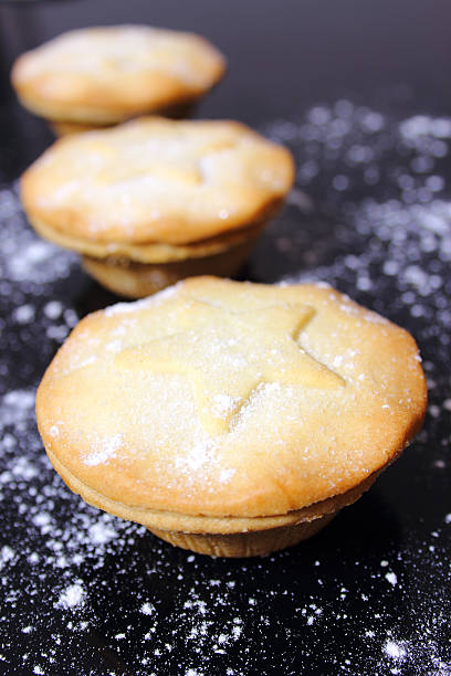 istock Three Mince Pies in a Row 136238572