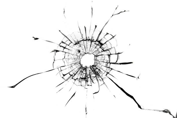 istock Shot hole, texture of cracks on the glass. Broken windshield. Damaged car window 1362387449