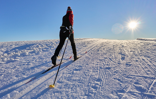 active woman, cross-country skiing Allgaeu Alps near Oberstaufen, Bavaria, Germany