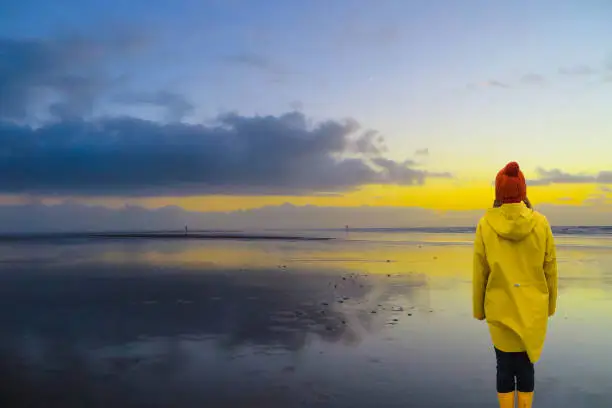 Photo of Woman looking to Sea