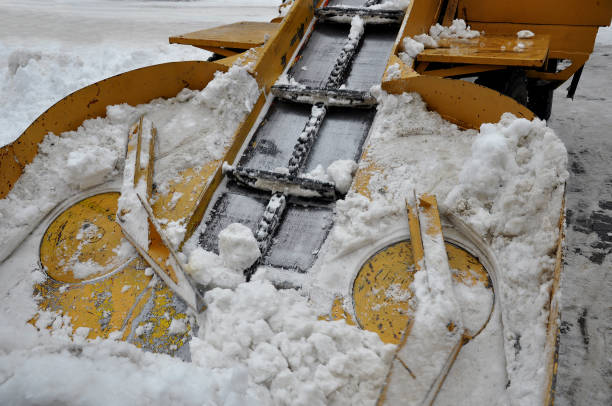 istock Snow blower conveyor shovels snow, selective focus. 1362392817