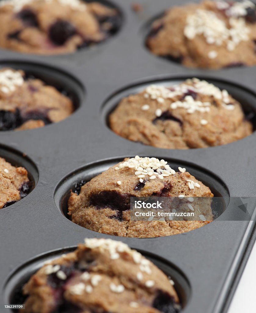 Blueberry Muffins Fresh baked muffins for the morning Muffin Tin Stock Photo