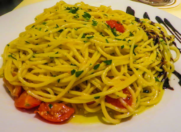 istock Spaghetti with Oil and Tomatoes 1362397113