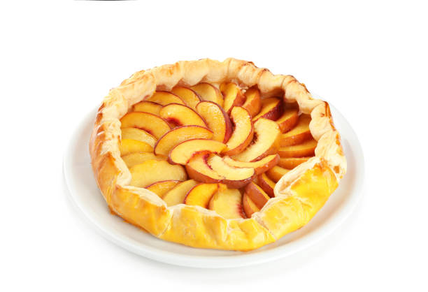 istock Delicious fresh peach pie isolated on white 1362400233