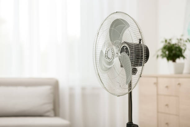 istock Modern electric fan in room. Space for text 1362404810