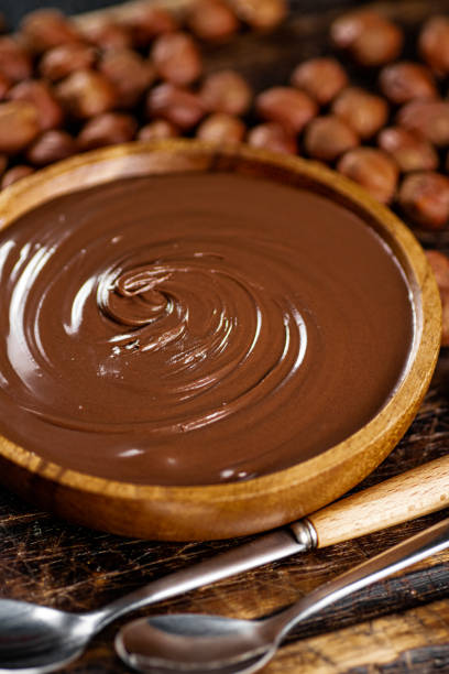istock Hazelnut butter in a plate on a cutting board. 1362405042