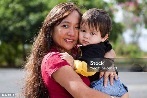Grandma Hugging Child Stock Photo - Download Image Now - Pacific Islanders, Baby - Human Age, Women