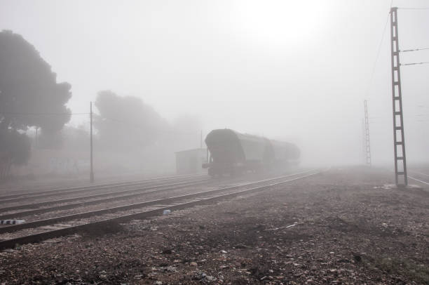istock old train tracks forgotten on a foggy day 1362418449