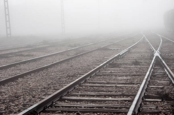 istock old train tracks forgotten on a foggy day 1362418469