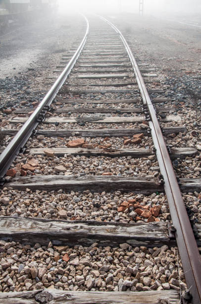istock old train tracks forgotten on a foggy day 1362418487