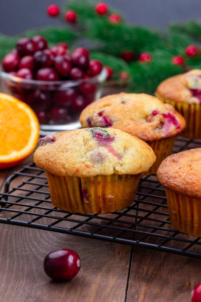 istock Cranberry orange muffins on cooling rack, vertical 1362420962