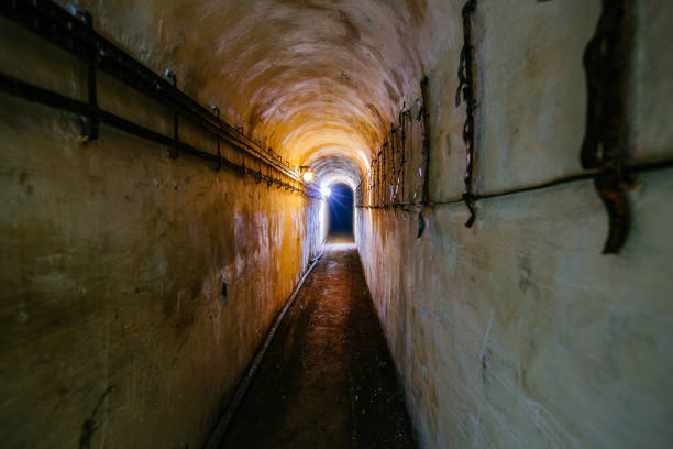 Tunnel of old underground communication. Subway or other construction.