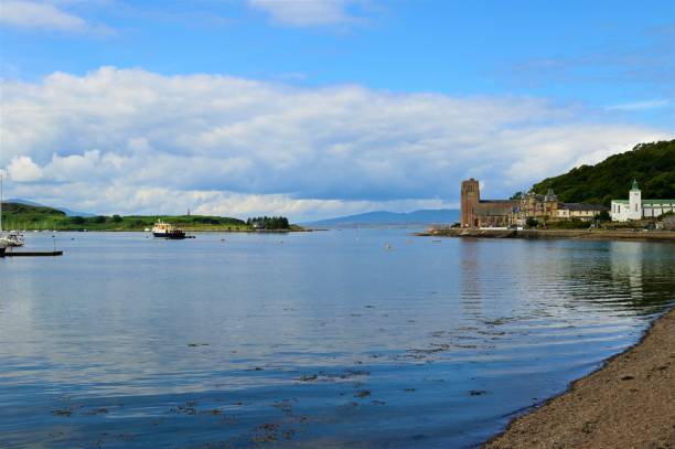 Landscapes of Scotland - Oban A coastal view from the Scottish west highland town of Oban looking to the islands of Kerrera and Mull. oban stock pictures, royalty-free photos & images