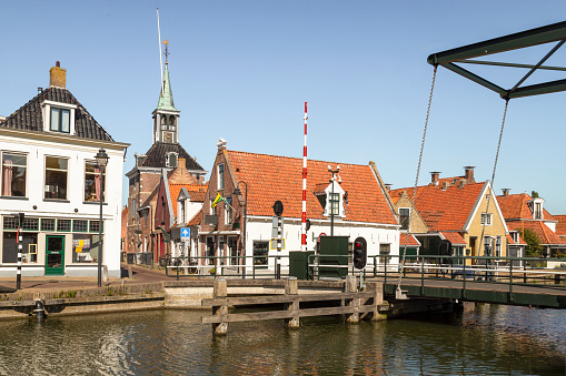Center of the small atmospheric fishing village Makkum on the Ijsselmeer in the province of Friesland in the Netherlands.