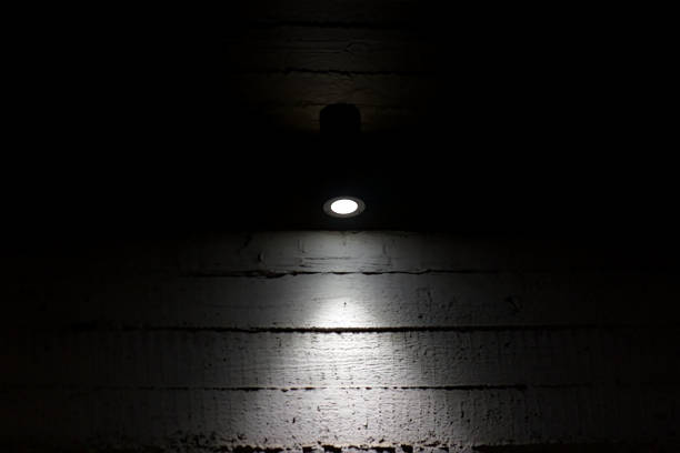 istock the lamp illuminates a rough wall 1362427496
