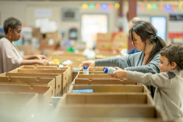 istock Packing Food Donations Together 1362428186