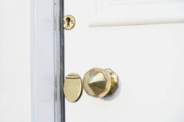 istock Brass door handle and key hole on victorian door 1362428396