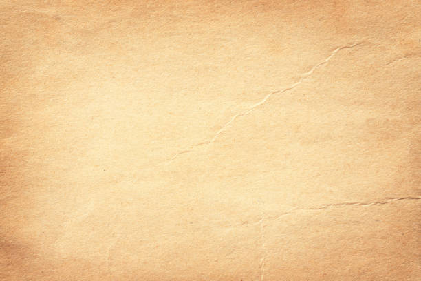 istock vintage paper texture. old page darkened manuscript background 1362429638