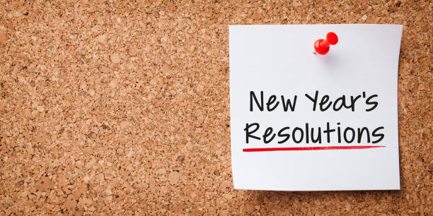 istock White Sticky Note With New Year Resolutions And Red Push Pin On Cork Board 1362430241