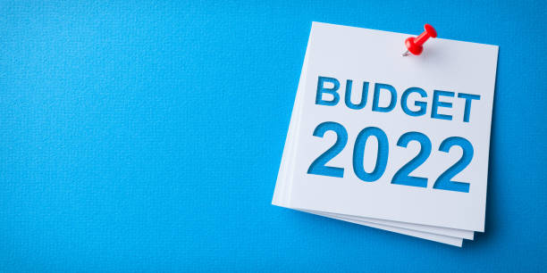 istock Budget 2022 Word in Yellow Sticky Note on Blue Background 1362430369