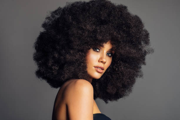 istock Beautiful woman with afro hairstyle 1362431380