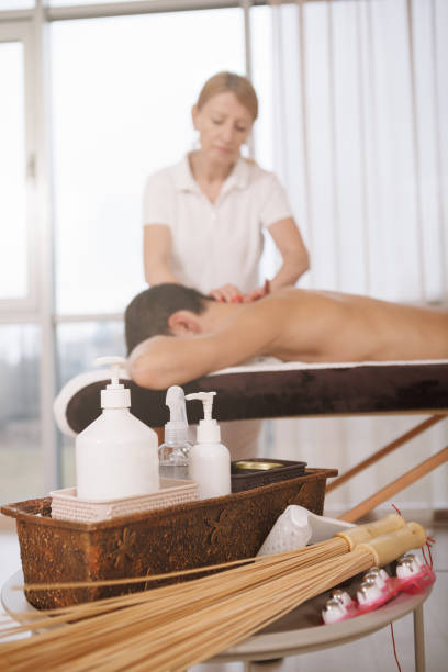 istock Mature man getting professional massage 1362432627