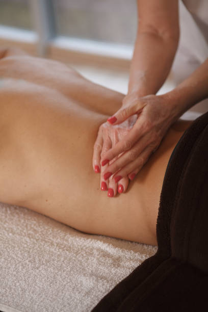 istock Mature man getting professional massage 1362432740