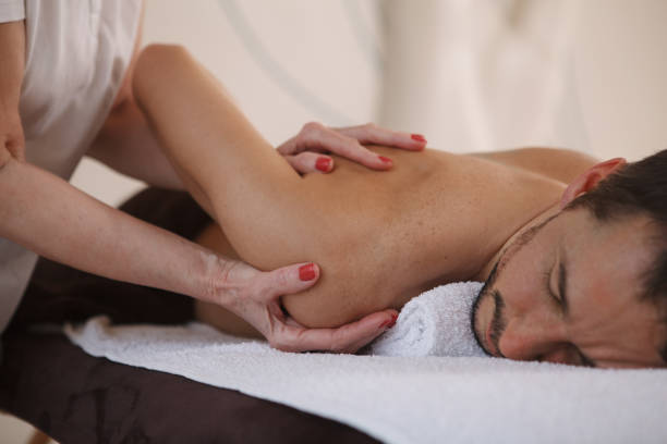 istock Mature man getting professional massage 1362432744