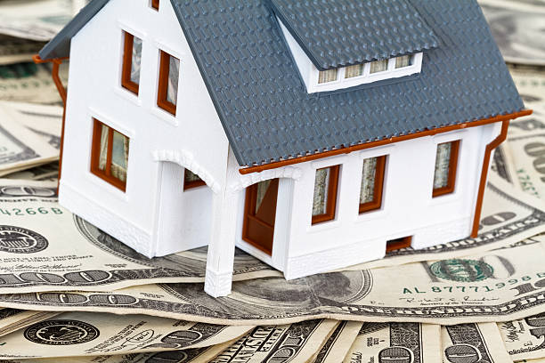 istock house with money 136243334
