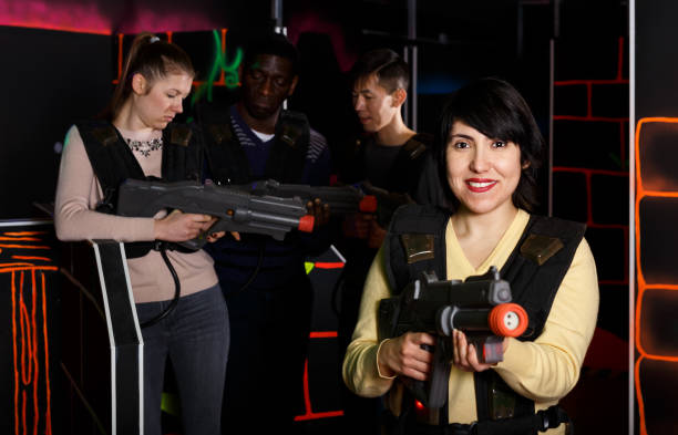 istock Glad Aztec woman holding laser gun 1362433959