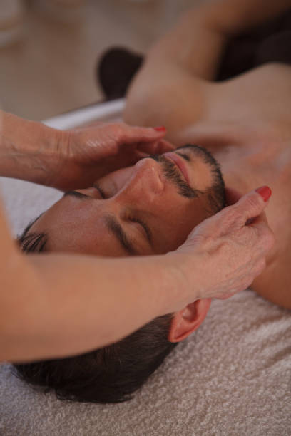istock Mature man getting professional massage 1362434410