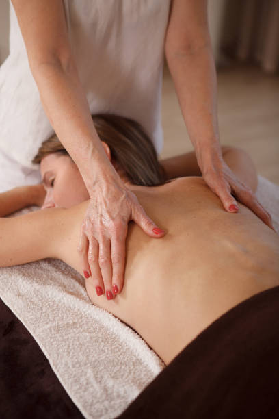 istock Mature woman getting massage at spa 1362436067