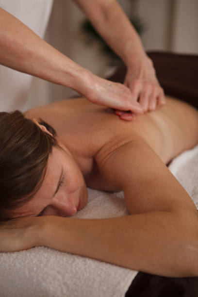 istock Mature woman getting massage at spa 1362436225