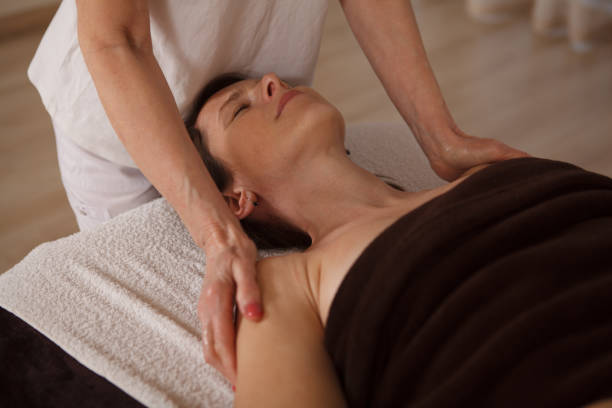 istock Mature woman getting massage at spa 1362437039