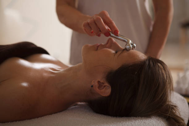 istock Mature woman getting massage at spa 1362438081