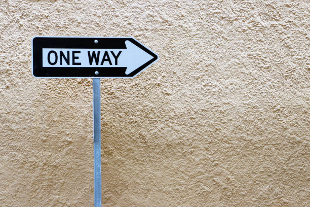 One Way Directional Sign one way stock pictures, royalty-free photos & images