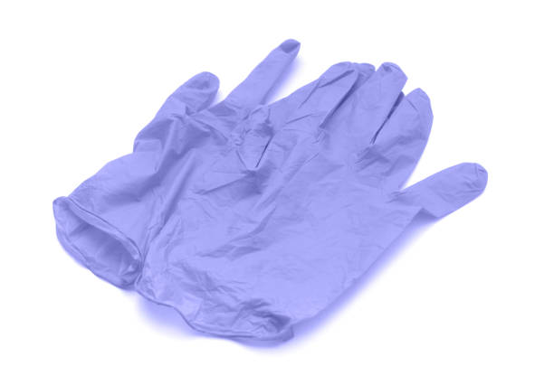 istock Very peri toned medical gloves isolated on white background 1362444916