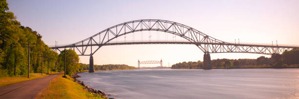 istock Panoramic seascape with Bourne Bridge over Cape Cod Canal and bikeways at high tide 1362447144