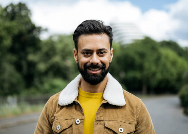 istock Close-up of bearded Indian man with cheerful expression 1362448781