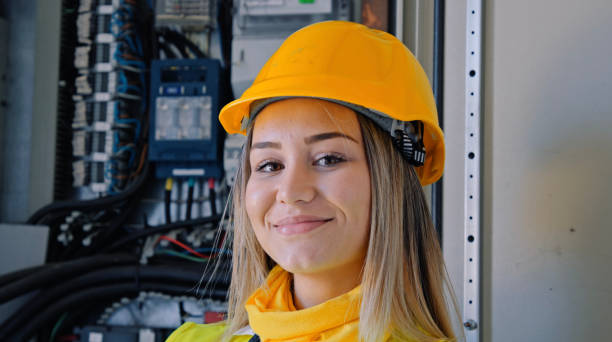 istock Female engineer working in solar power plant. Renewable energy systems. Solar city. 1362449147